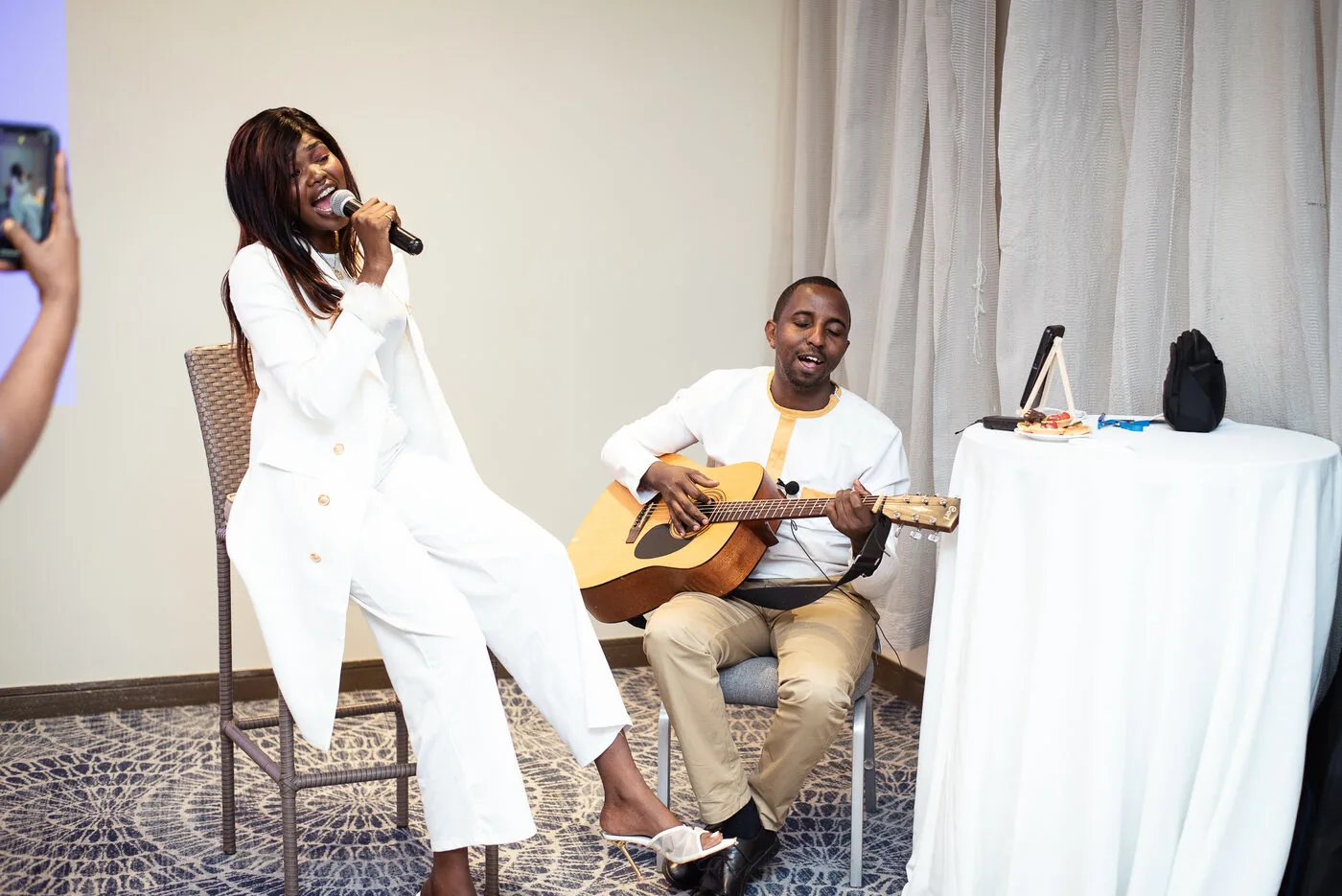 Live performance with a guitarist — warm community moment